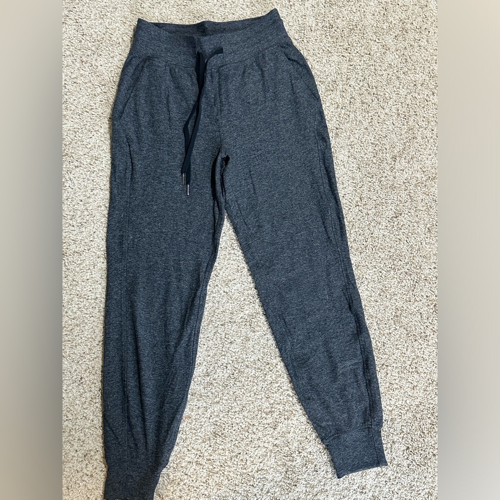 Ready to RULU Lulumelon Joggers Charcoal/black in color